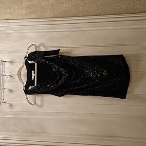 Black finely sequined top.